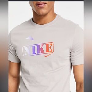 Nike "Party At The Rack" Graphic Dri Fit T-Shirt